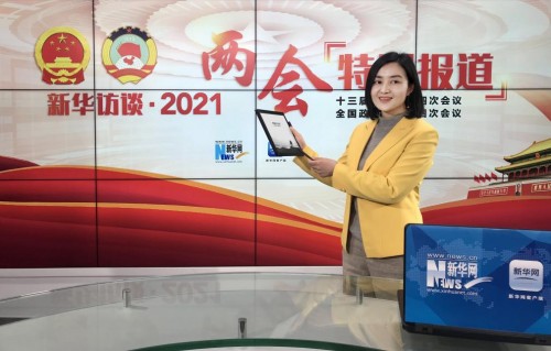 新華社兩會(huì)報(bào)道黑科技——訊飛智能辦公本